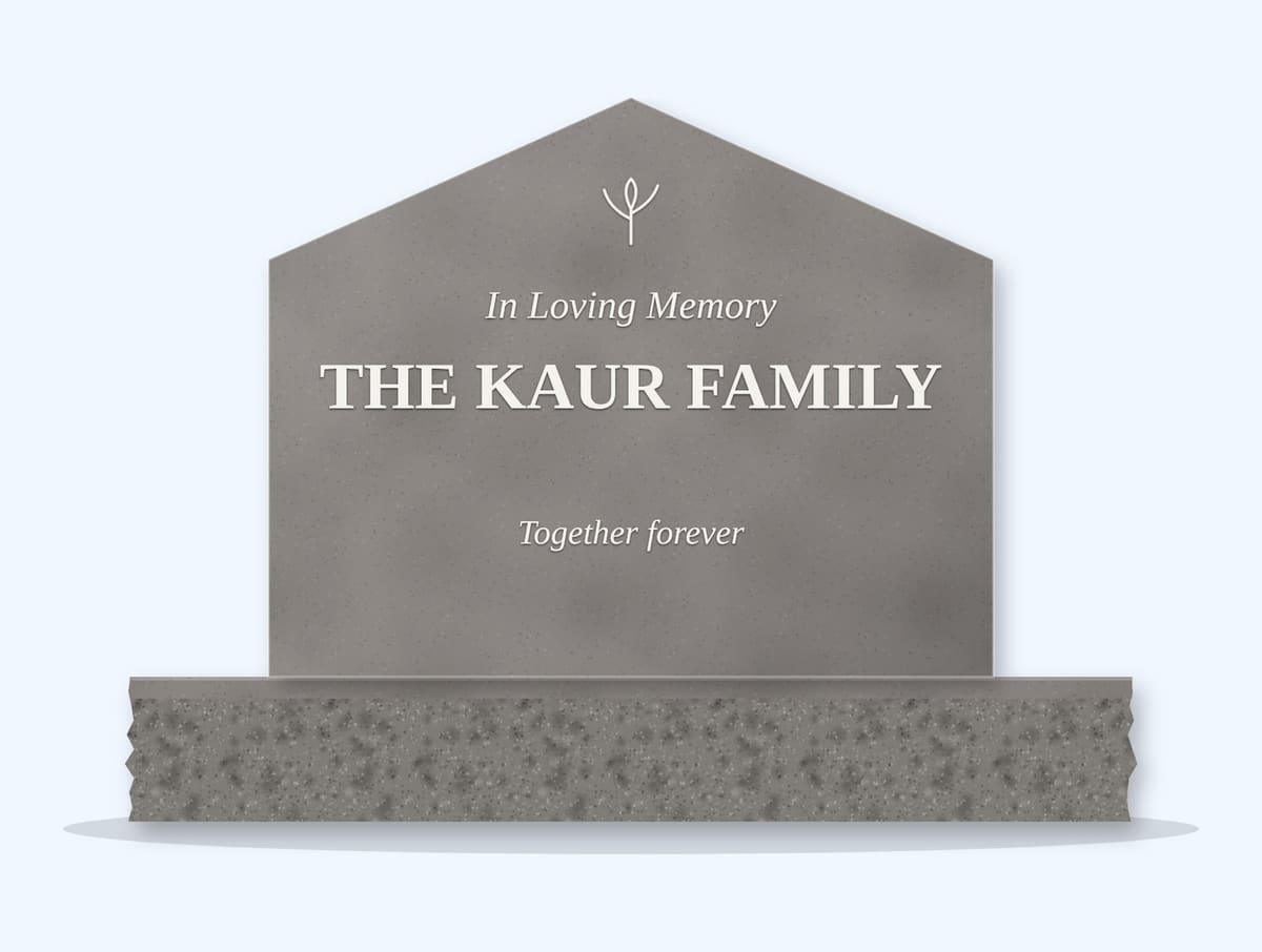 Indian Grey gable headstone on a granite base, engraved for the Kaur Family