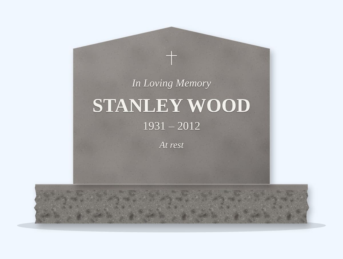 Indian Grey peak headstone on a granite base, engraved for Stanley Wood