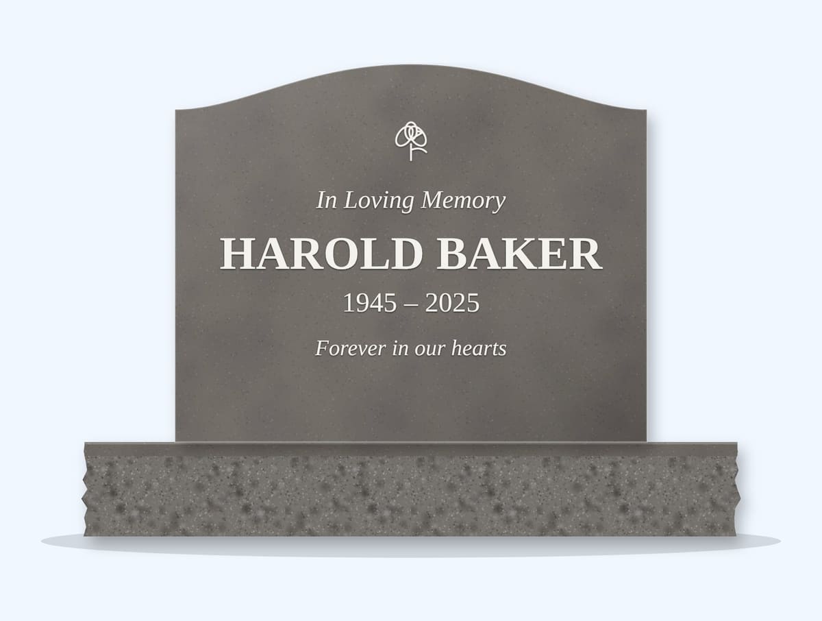 Steel Grey serpentine headstone on a granite base, engraved for Harold Baker