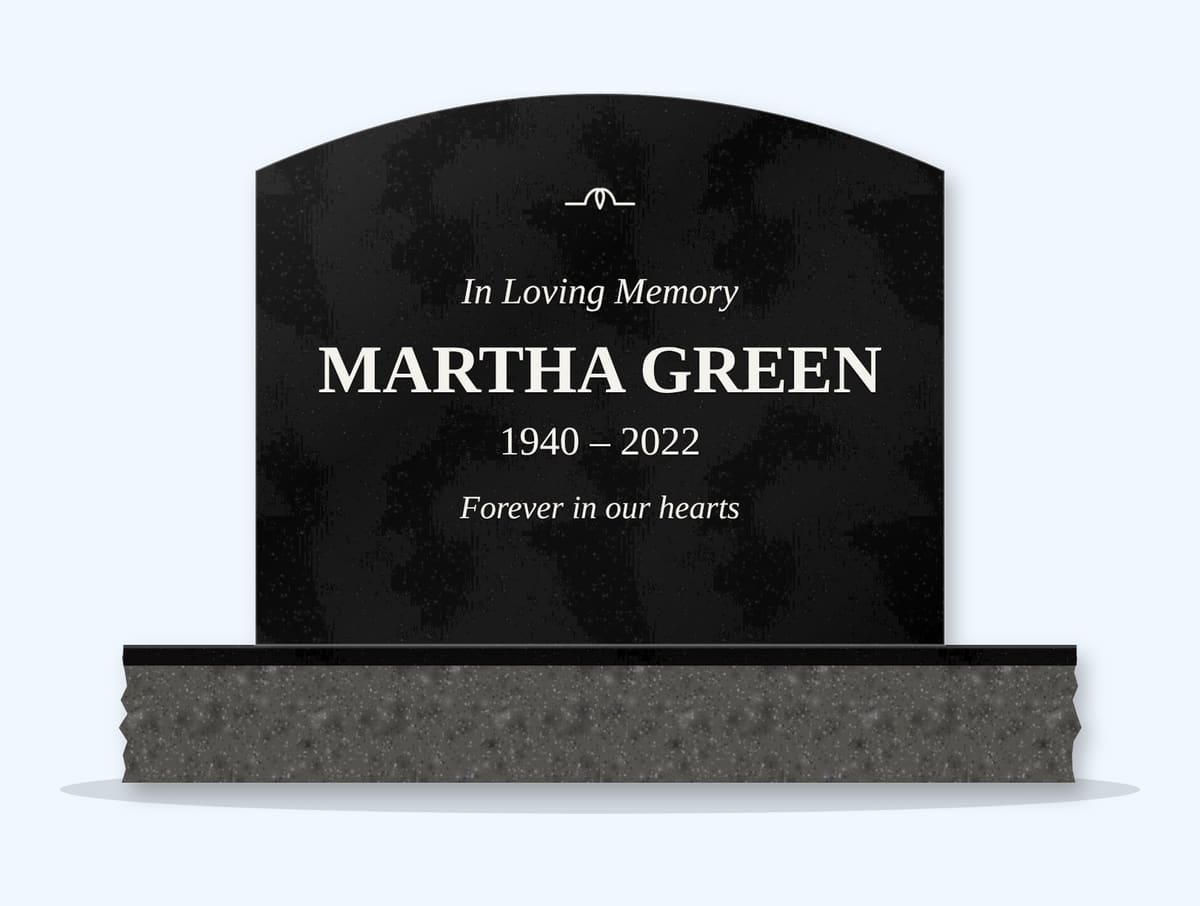Absolute Black curved top headstone on a granite base, engraved for Martha Green