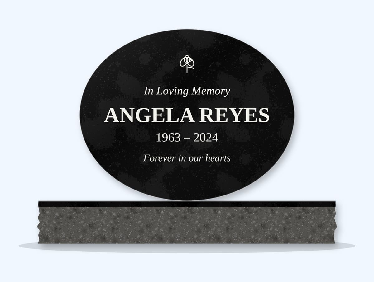 Absolute Black oval headstone on a granite base, engraved for Angela Reyes