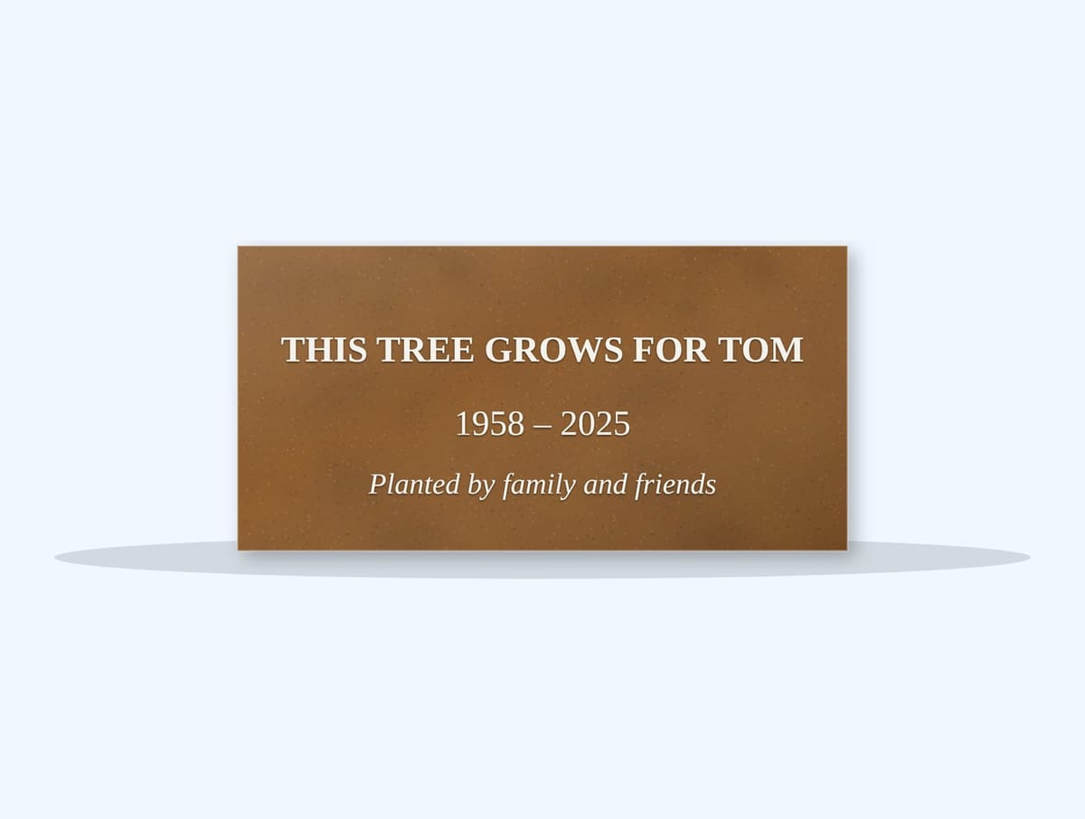 Tan Brown flat grave marker engraved for Tom