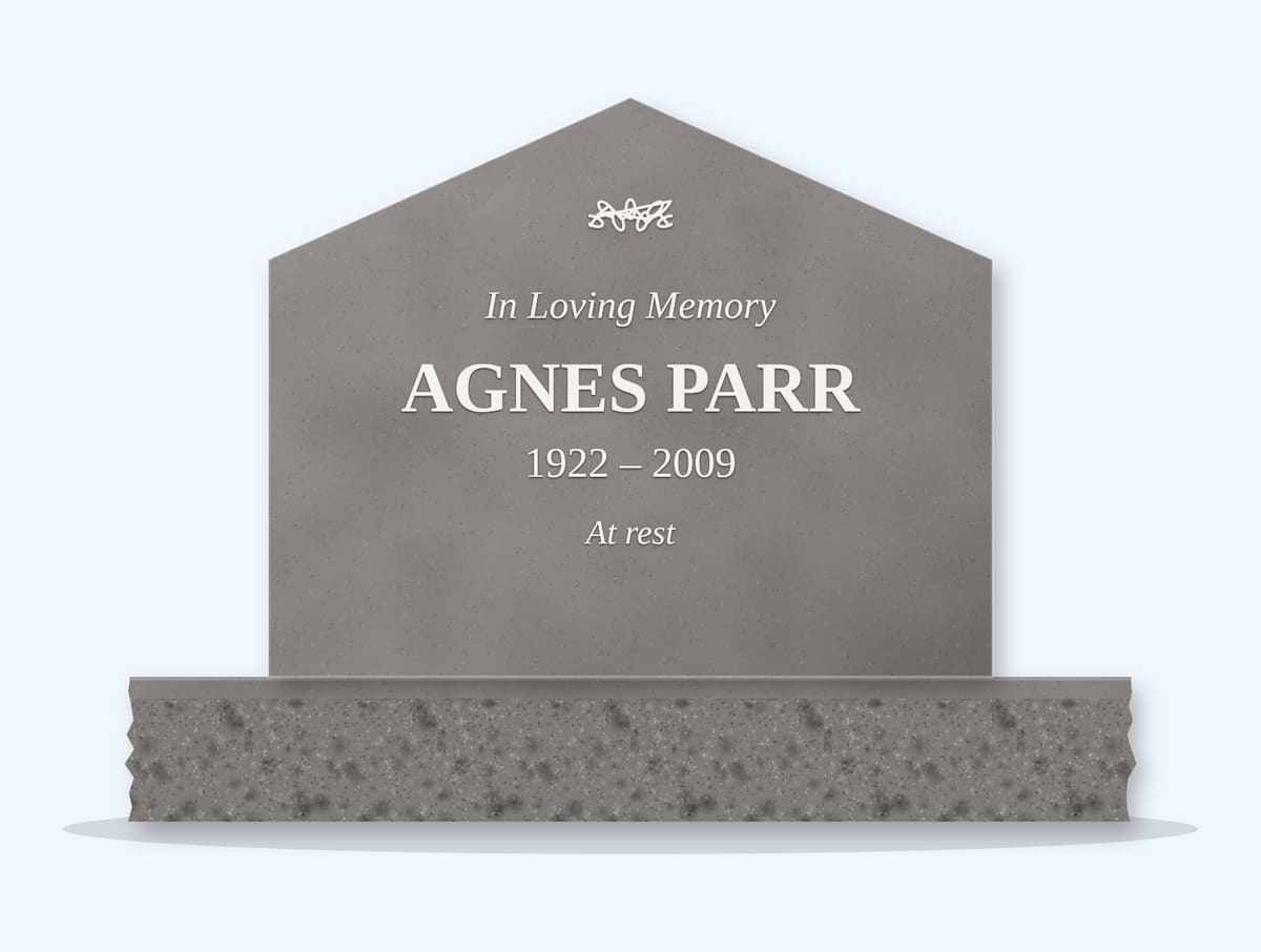 Indian Grey gable headstone on a granite base, engraved for Agnes Parr