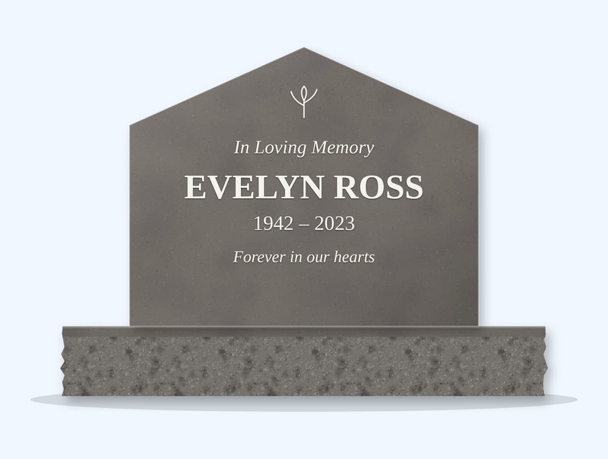 Steel Grey gable headstone on a granite base, engraved for Evelyn Ross