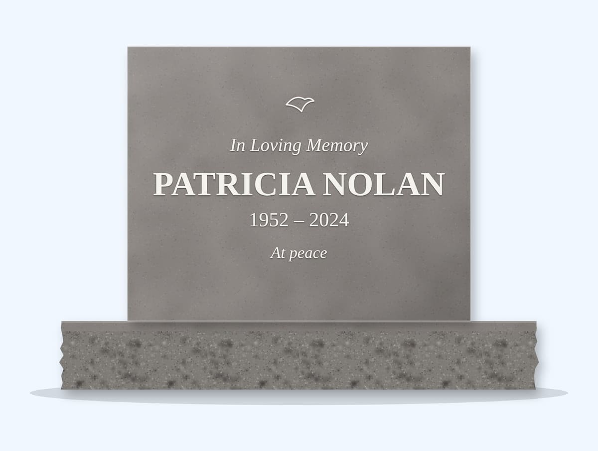 Indian Grey square headstone on a granite base, engraved for Patricia Nolan