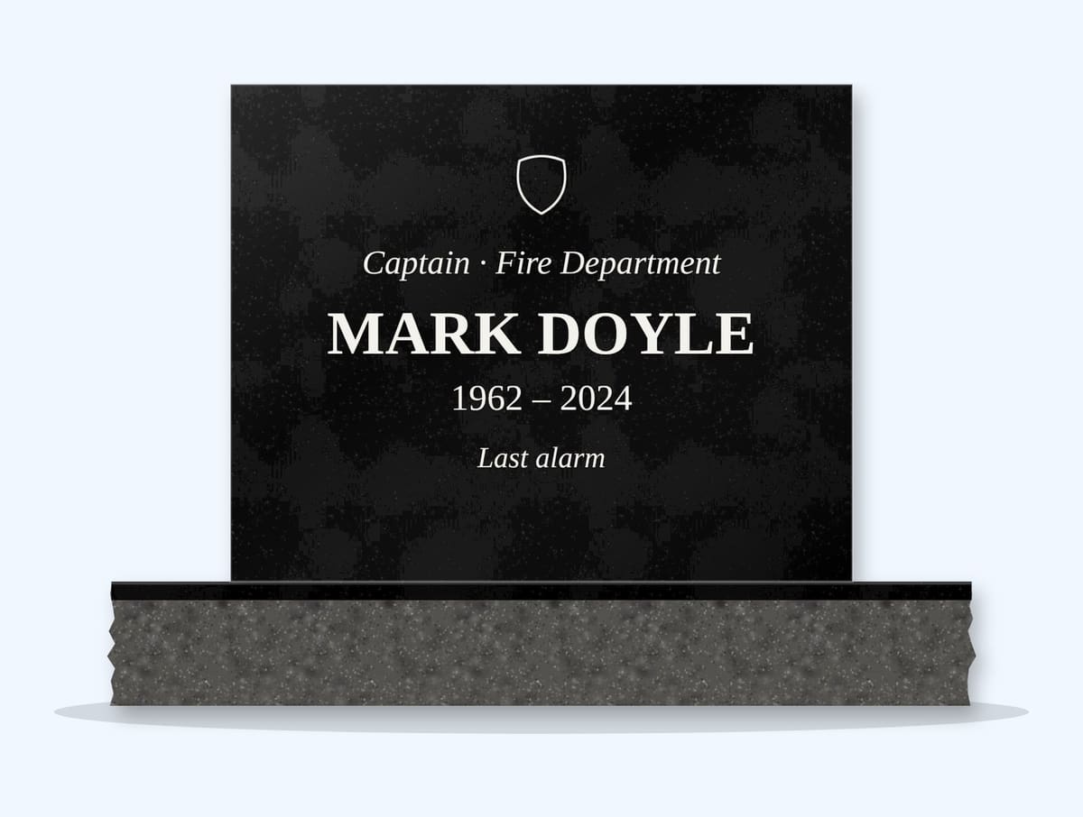 Absolute Black square headstone on a granite base, engraved for Mark Doyle