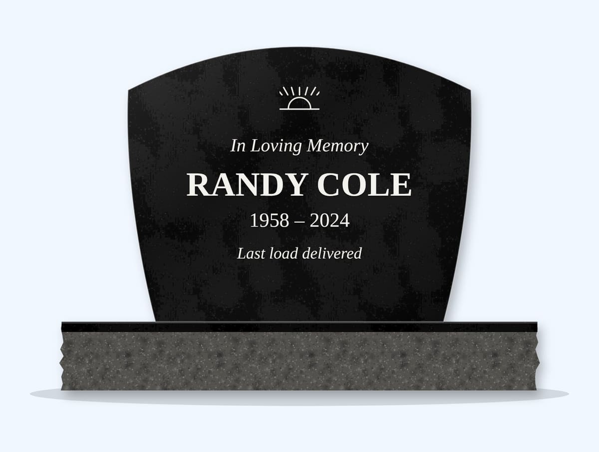 Absolute Black swoop headstone on a granite base, engraved for Randy Cole