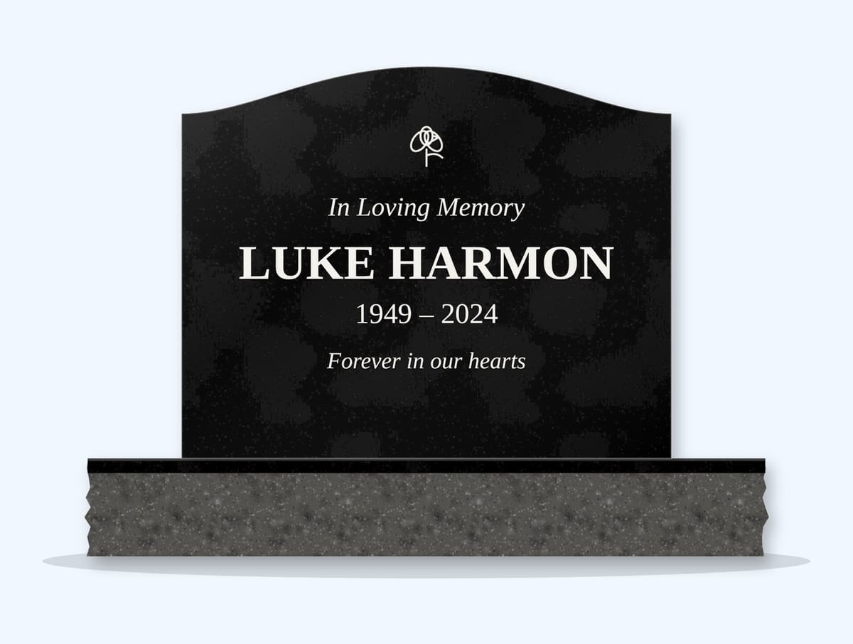 Absolute Black serpentine headstone on a granite base, engraved for Luke Harmon