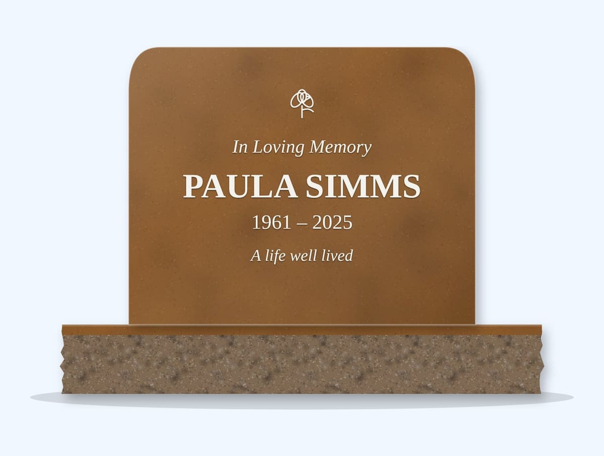 Tan Brown rounded top headstone on a granite base, engraved for Paula Simms