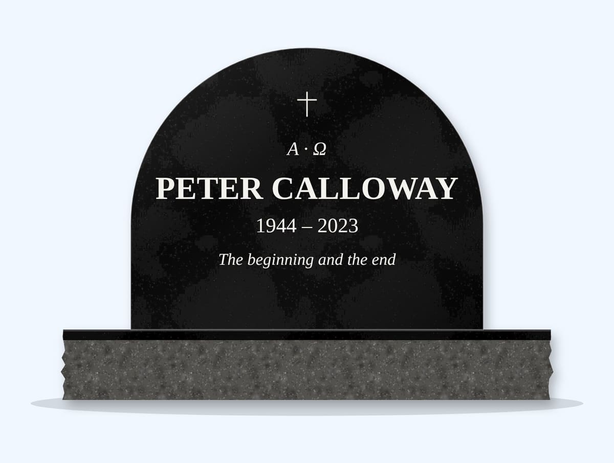 Absolute Black half round headstone on a granite base, engraved for Peter Calloway