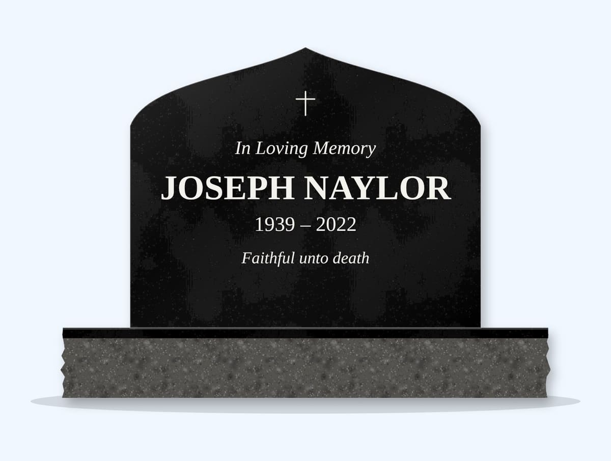 Absolute Black curved peak headstone on a granite base, engraved for Joseph Naylor