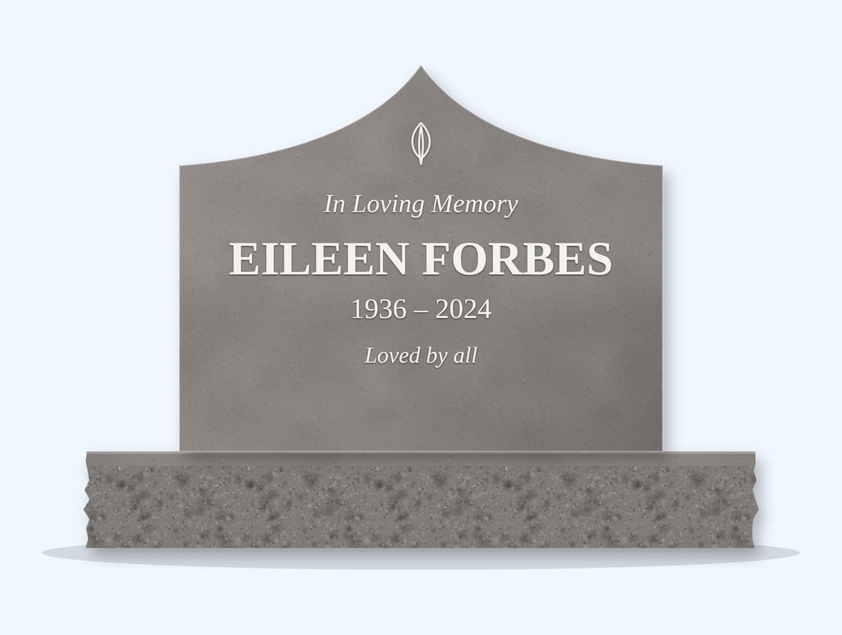 Indian Grey curved gable headstone on a granite base, engraved for Eileen Forbes