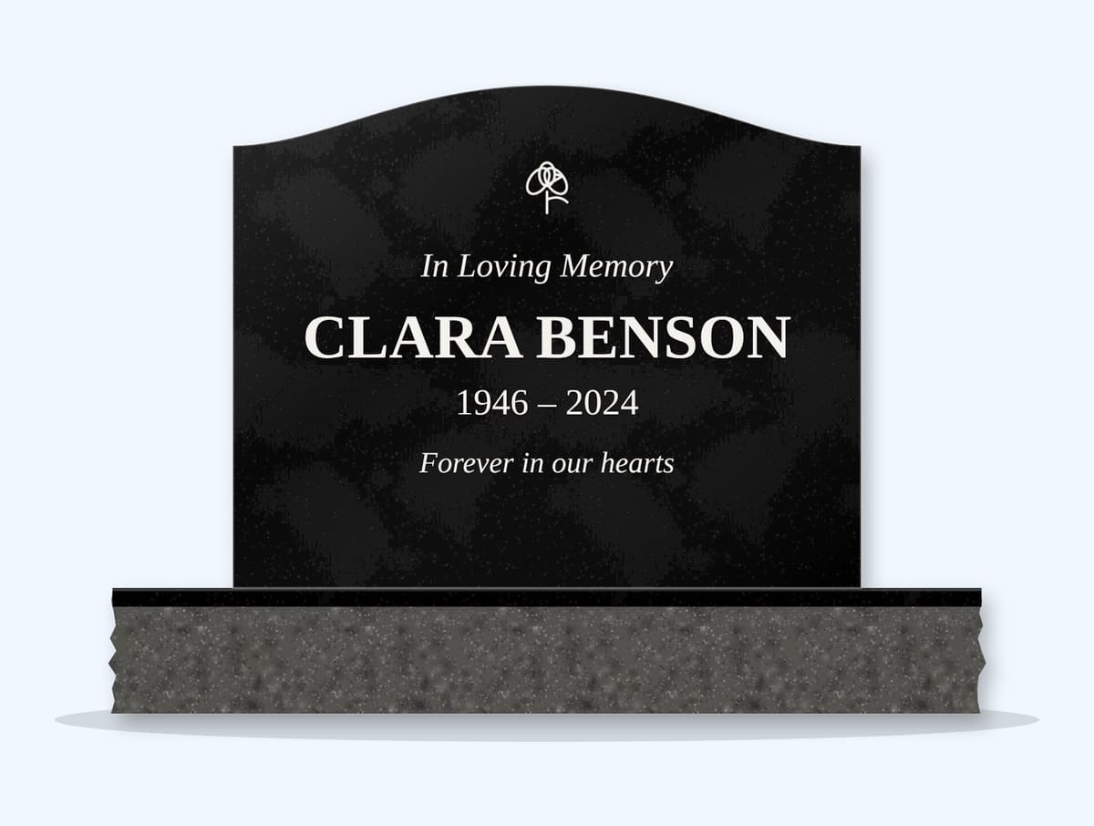 Absolute Black serpentine headstone on a granite base, engraved for Clara Benson