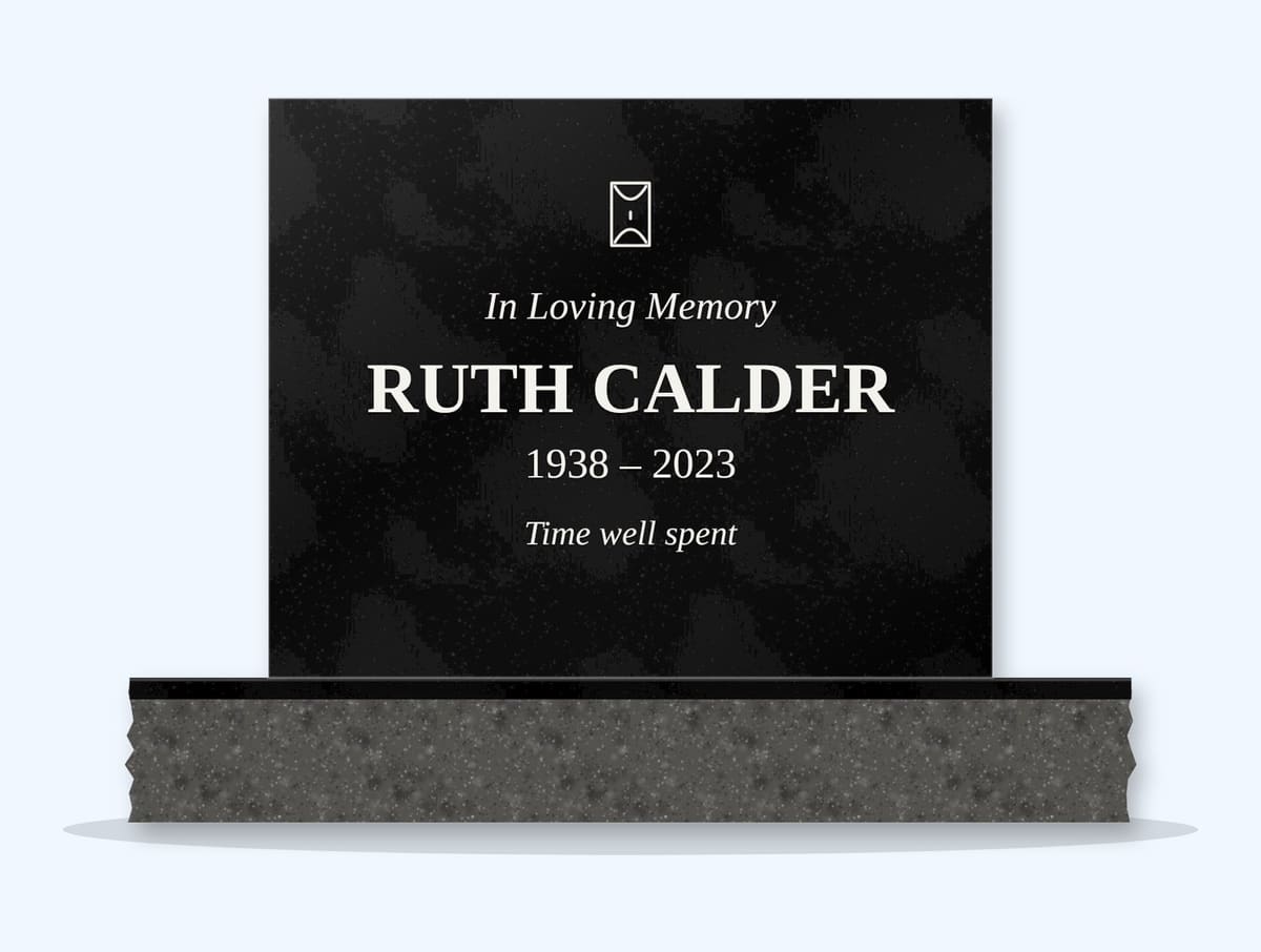Absolute Black square headstone on a granite base, engraved for Ruth Calder