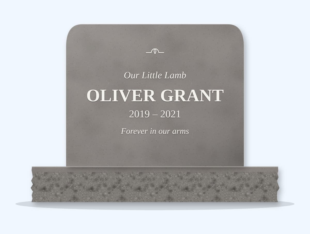 Indian Grey rounded top headstone on a granite base, engraved for Oliver Grant