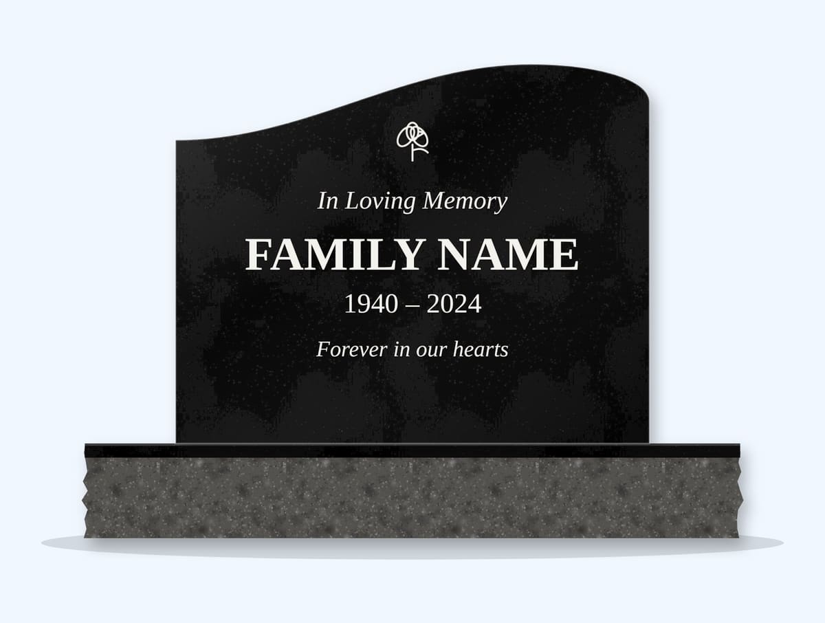 Absolute Black right wave headstone on a granite base, engraved for a sample catalogue design
