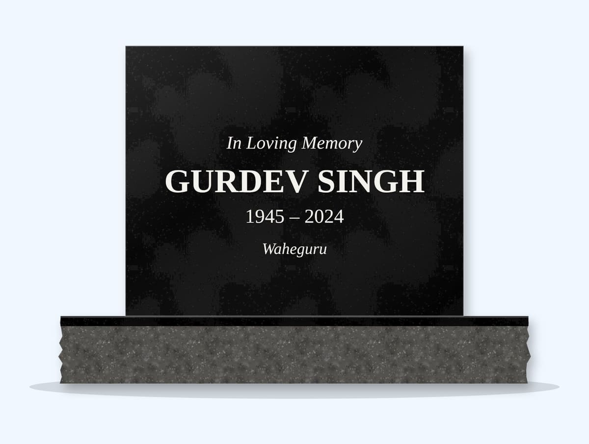 Absolute Black square headstone on a granite base, engraved for Gurdev Singh