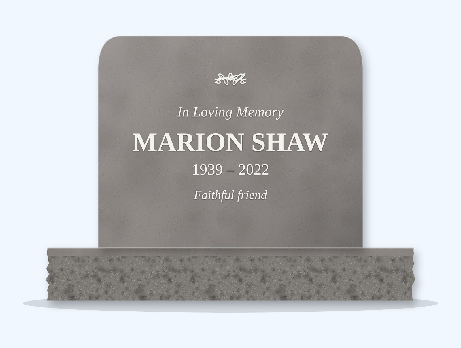 Indian Grey rounded top headstone on a granite base, engraved for Marion Shaw