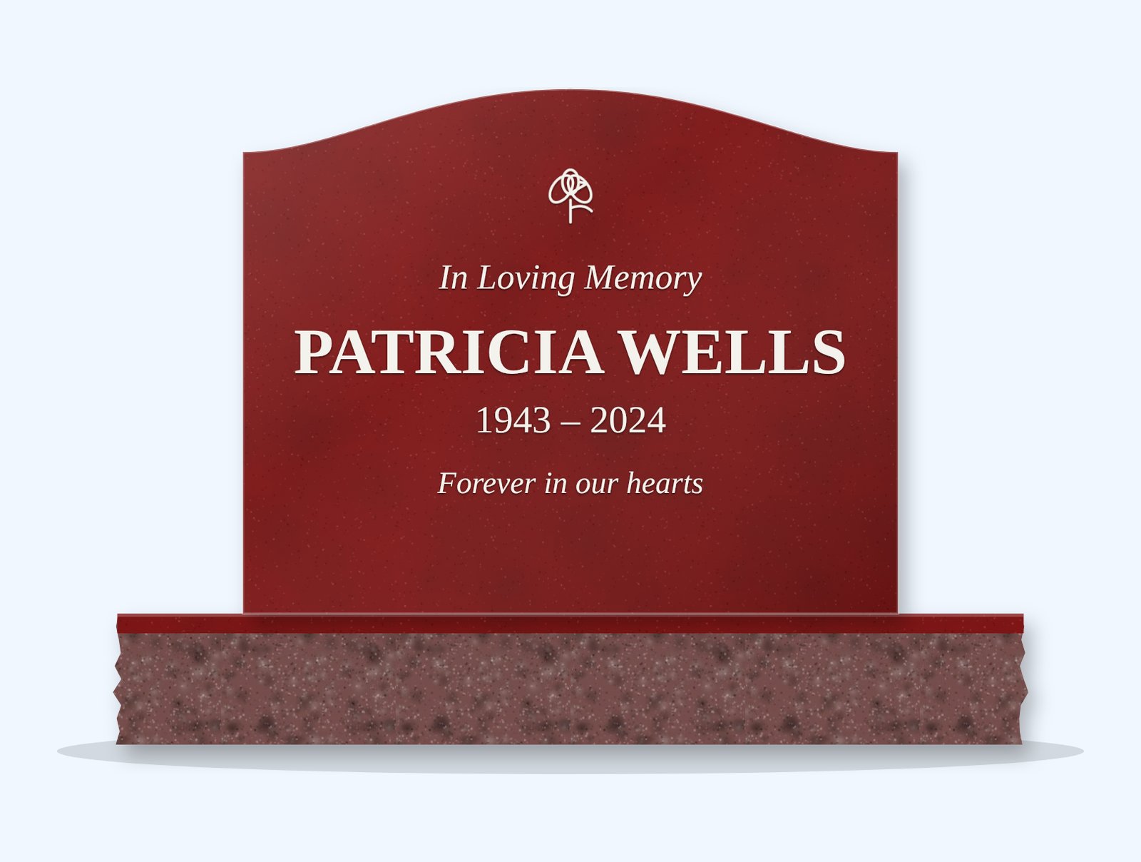 Indian Red serpentine headstone on a granite base, engraved for Patricia Wells