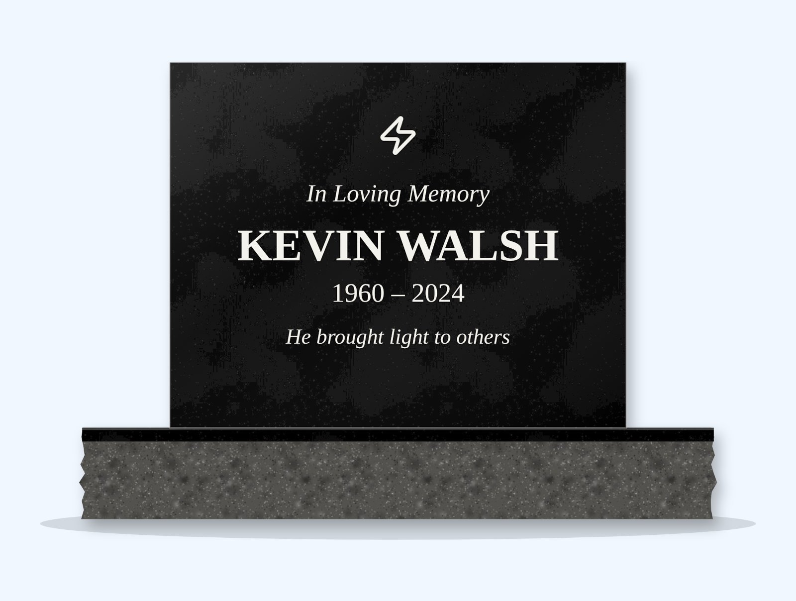 Absolute Black rectangle headstone on a granite base, engraved for Kevin Walsh