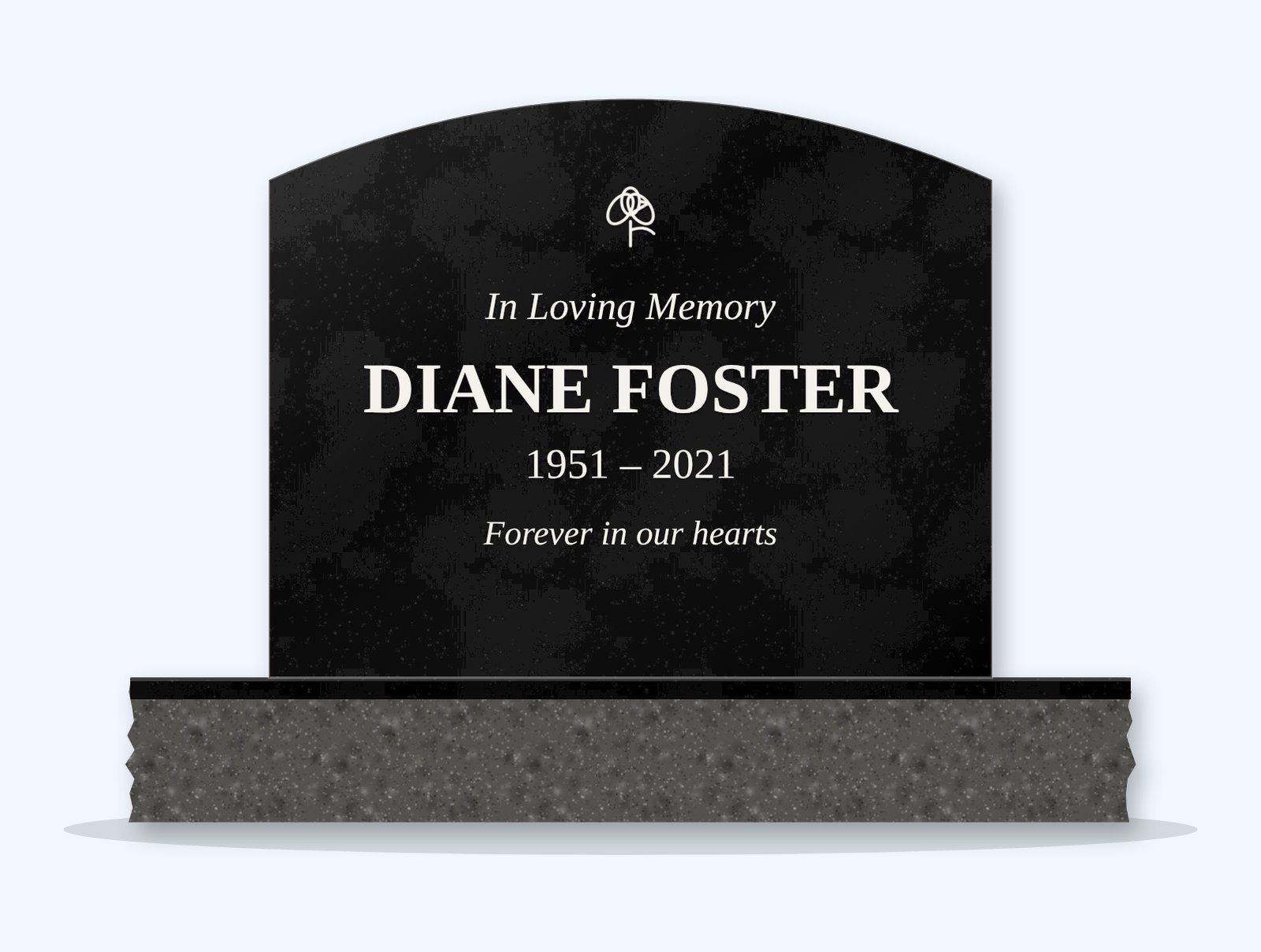 Absolute Black curved top headstone on a granite base, engraved for Diane Foster