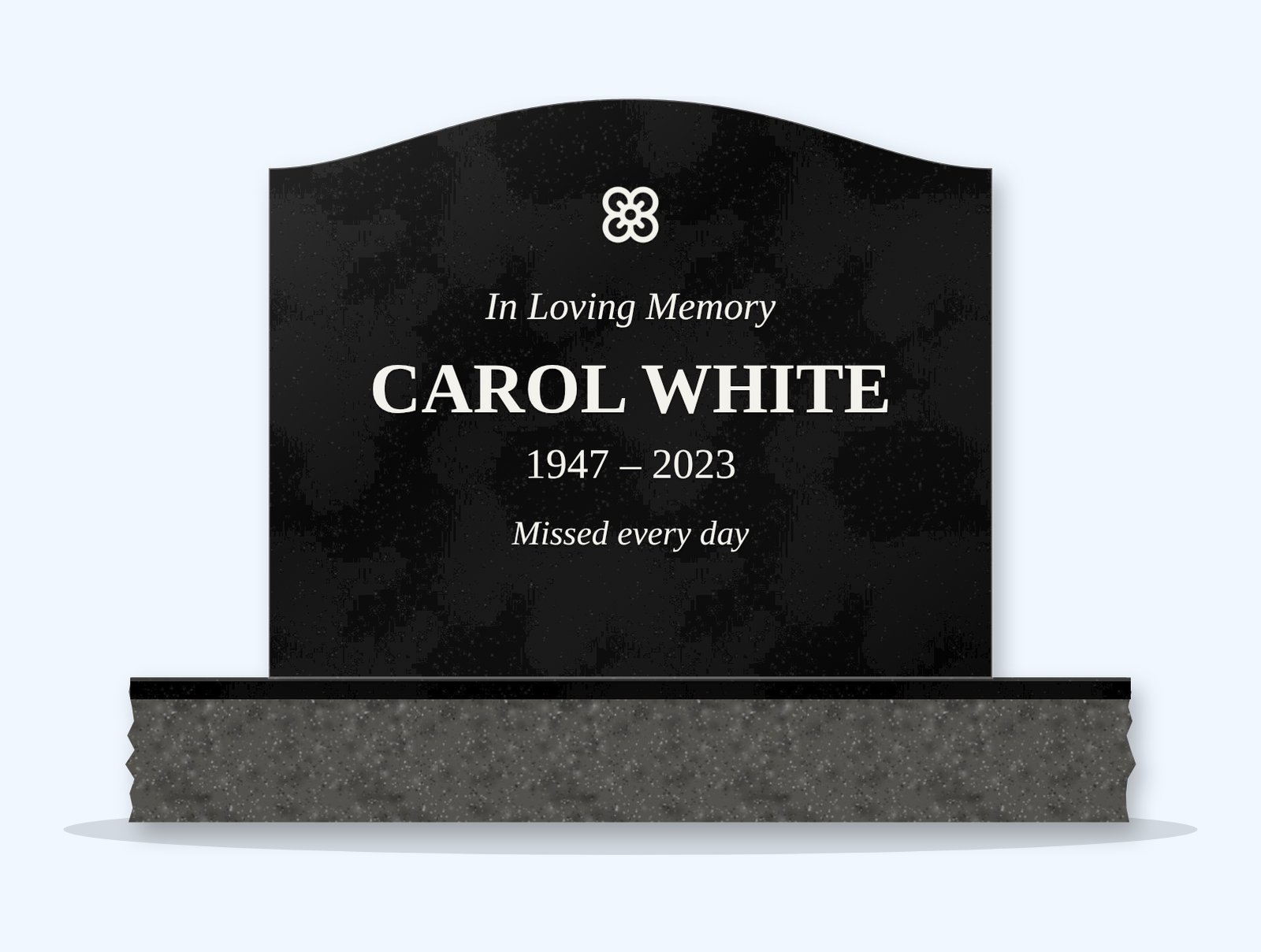 Absolute Black serpentine headstone on a granite base, engraved for Carol White