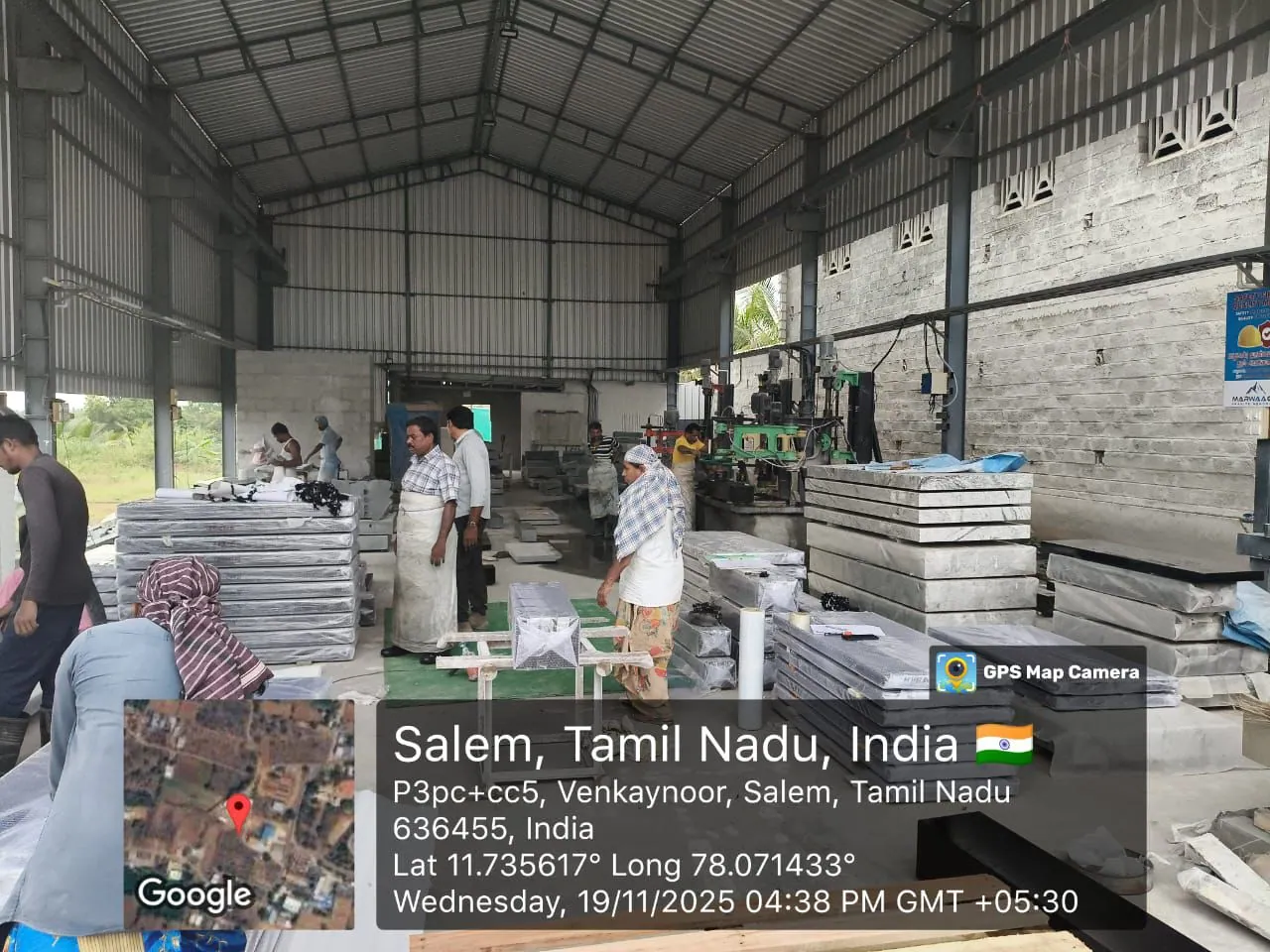Factory interior - granite slabs and workers