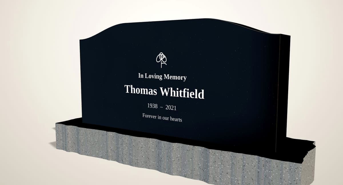 Black granite serpentine-top headstone on a rock-pitched base, rendered in the Marwaa Design Studio